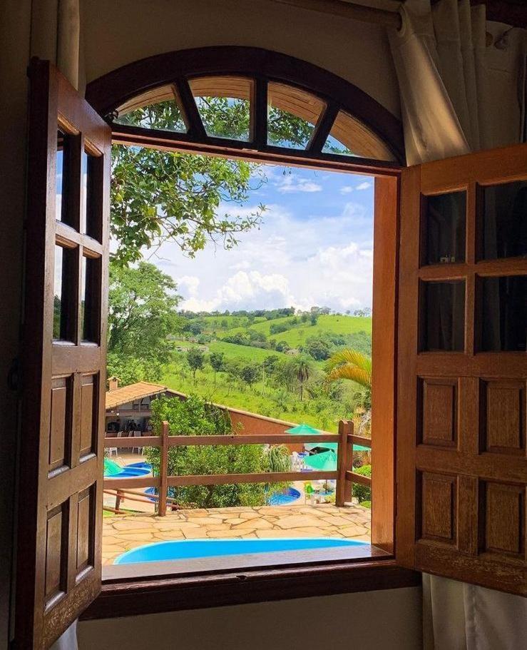 Hotel Fazenda Tucano Capim Branco Exterior photo